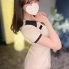 にこ
