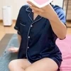 めい