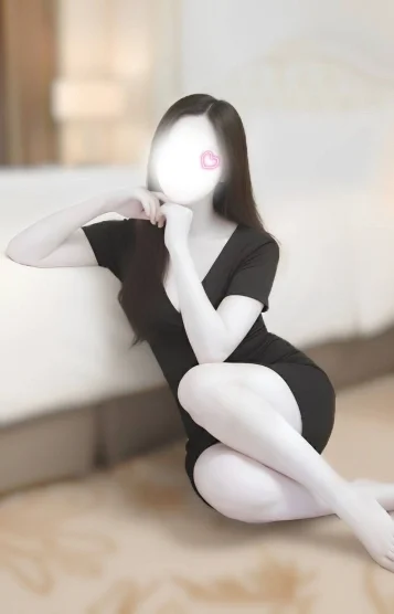 東條 綾
